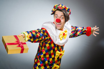 Funny clown in comical concept