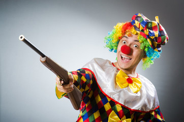 Funny clown in comical concept