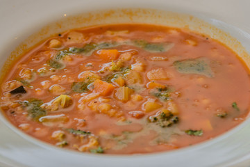 Italian minestrone soup made with summer vegetables and barley
