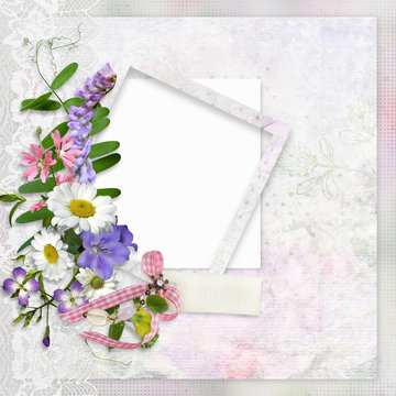 Vintage background with lace, frame for photo or text and a bouquet of summer meadow flowers