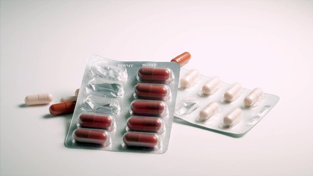 capsule tablet falling and bouncing,bouncing ,dropping ,falling ,medical, 