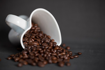 Coffee beans in a heart mug