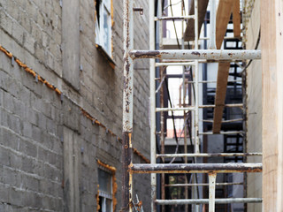 Old building scaffolding on the building