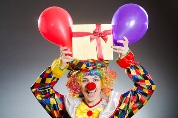 Funny clown in comical concept