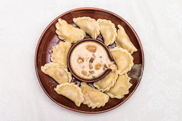 Dumplings in clay bowl