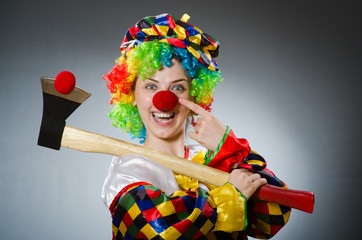 Funny clown in comical concept