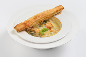 Julienne of seafood, white background, menu concept.