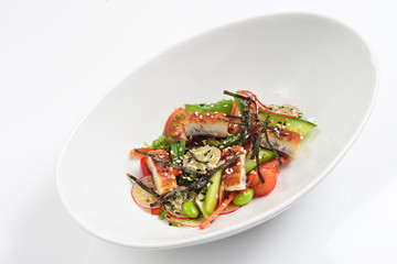 Creative salad with smoked eel, chukka and fresh cucumbers.