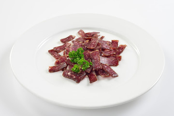 Jerky. Sujuk. Snack to beer. On white background, menu concept.
