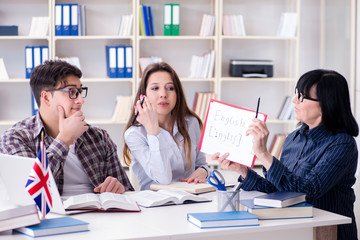 Young foreign student during english language lesson