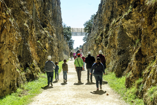 tourists visiting the excavations in the archaeological Atapuerca deposit in Burgos, Spain.