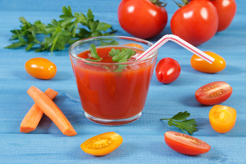 Tomato juice and vegetables with spices on board, healthy nutrition concept