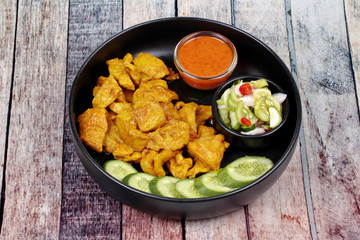 Charcoal boiled ,Pork satay served with side disk.