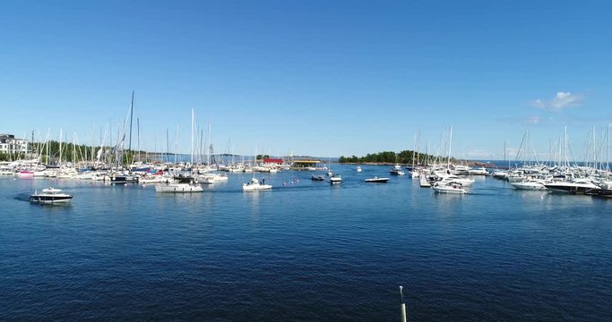 Hanko harbor, Cinema 4k aerial view over a lot of boats, in ita-satama, on hango regatta day, in the finnish archipelago city Hanko, Finland