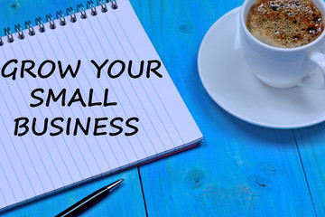 Grow your small business words on notebook