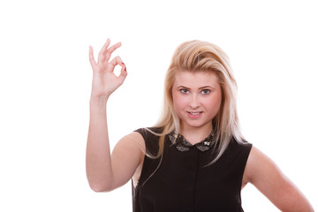 Blonde woman showing a ok gesture