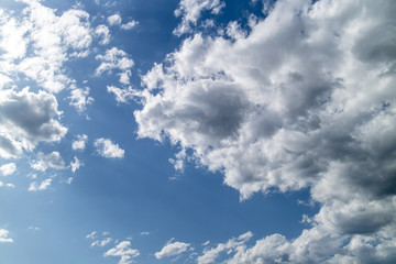 A bright blue background of sky and clouds 2