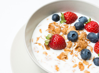 Cereal bowl with fruit healhy breakfast isolated on white