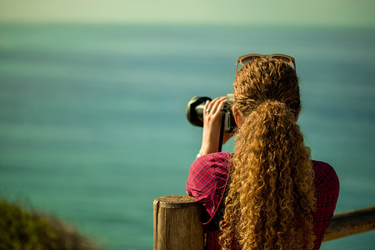 Woman Photographing Scenic View