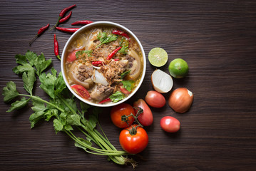 Spicy Oxtail Soup Traditional Muslim Food with Cow Tail Boiled with Spices - Cooking Concept