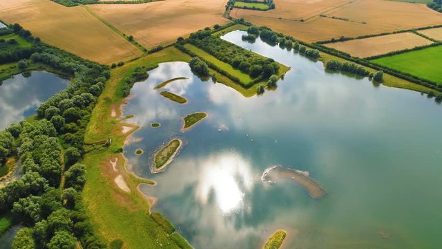 Natural Lake in British Countryside High Aerial View