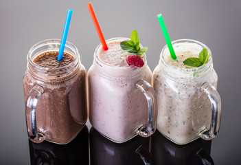 Milkshake in jar with a straw