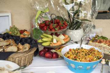 Variety of fresh salads bowls on buffet table business dinner