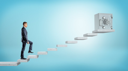 A businessman on blue background going upstairs to a large metal safe box on concrete blocks.