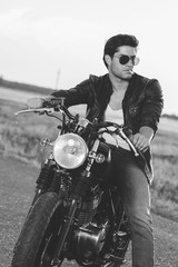 Biker man sits on a bike © zorandim75