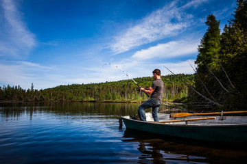 Fototapeta na wymiar Young Adult Fishing trout in a calm Lake