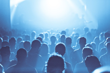 Blue ambiance and Crowd in silhouette during a Concert