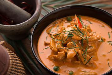 Thai style Red curry with Beef menu or Thai name is panaeng neur. Beef menu with coconut milk.Panaeng Curry with Pork on Wooden table