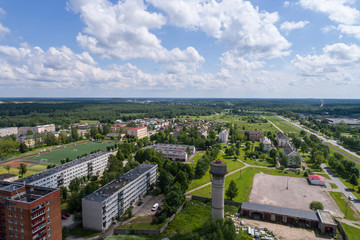 Aerial photography. Small city landscape, amazing clouds.