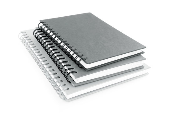 Stack of notebooks (or copybooks) isolated on white background