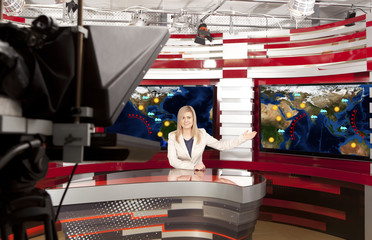 A television anchorwoman at studio