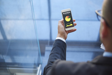 Smart phone used by a modern businessman