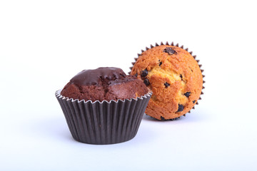 Fresh homemade muffins on white background. Top view.