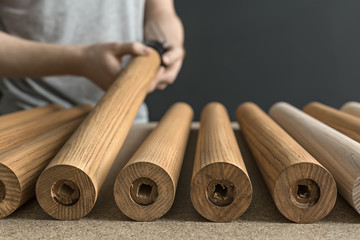 Man taking wooden billet 