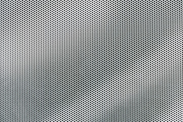 Gray metal background, round perforated metal texture with reflections