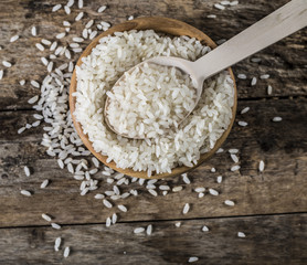 rice, jasmine rice, mali rice in Ladle and basket on the wood background