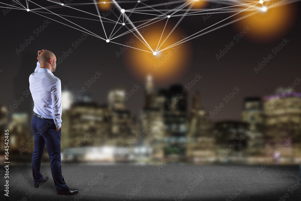 Poster businessman in front of a wall with web operating system screen and network connection displayed on 