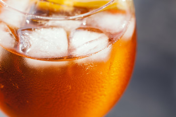 Aperol spritz cocktail in misted glass, selective focus