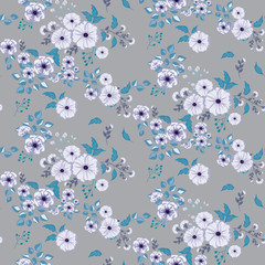Seamless floral pattern. Background in small blue flowers on a gray background for textiles, fabric, cotton fabric, covers, wallpaper, print, gift wrap, postcard, scrapbooking.