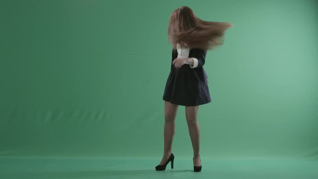 Beautiful girl with long hair dancing