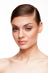 Obraz premium Gorgeous woman with natural make up on white background in studio photo