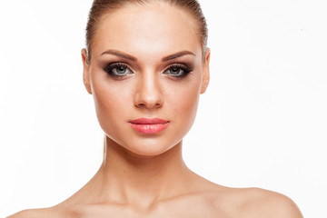 Fototapeta premium Blonde model with professional make up on white background