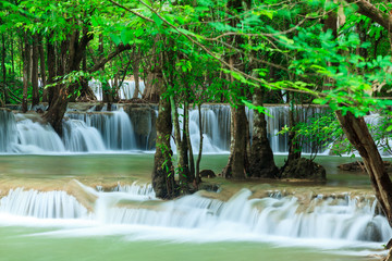 Deep forest waterfall at Huay Mae Kamin waterfall National Park Kanjanaburi Thailand