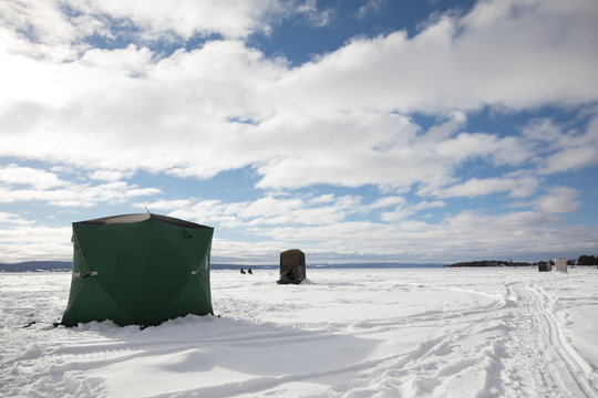 Ice Smelt Fishing Shack During A Cold But Sunny Day Of Winter In Quebec