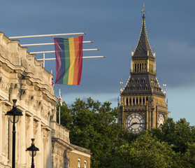Big Ben tower of London Parliament with gay flag during Gay Pride parade