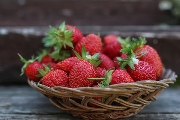 Strawberry on rustic wooden background